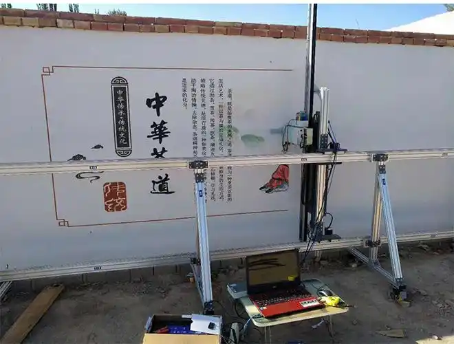 Indoor jobsite setup for wall printing with protected floor and controlled print zone